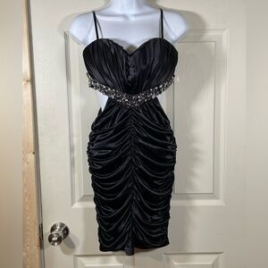 Sophisticated Black Backless Dress with Embellishments